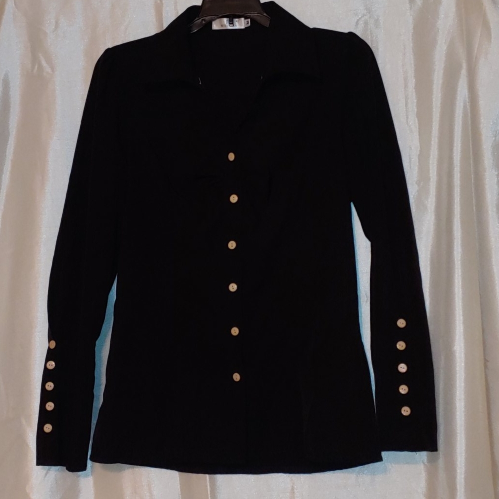 Long sleeved, button up blouse.